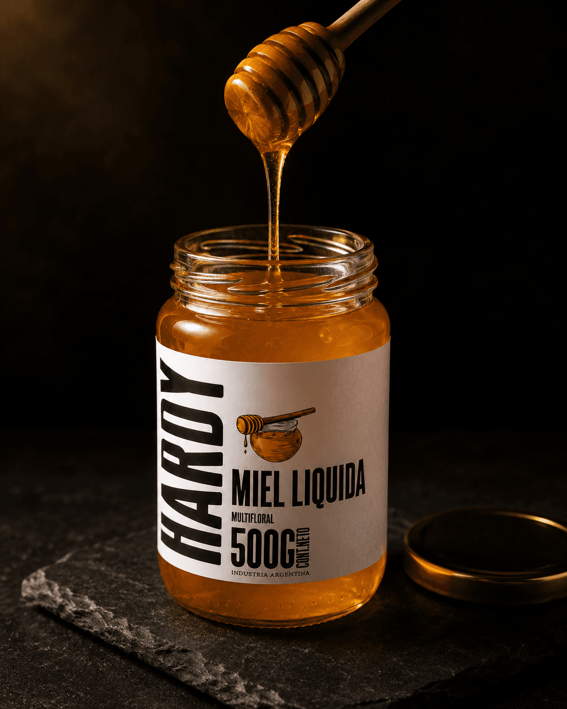Miel líquida HARDY — chorreado de miel desde cucharón de madera